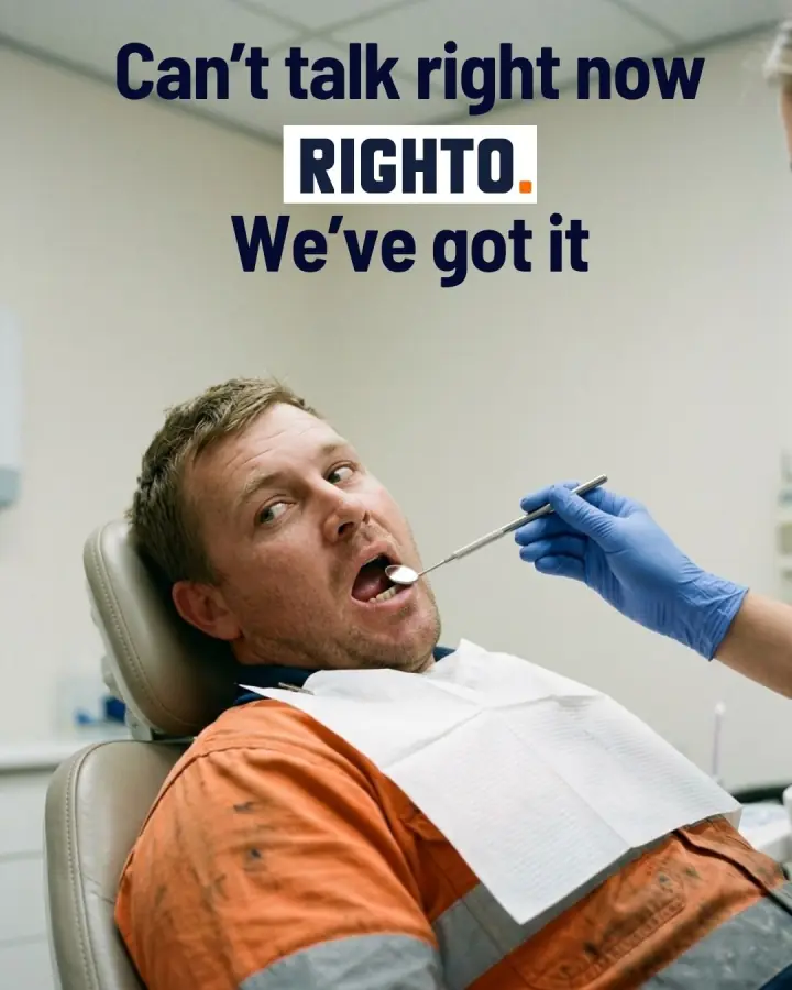 Tradie in the dentist chair while his phone rings