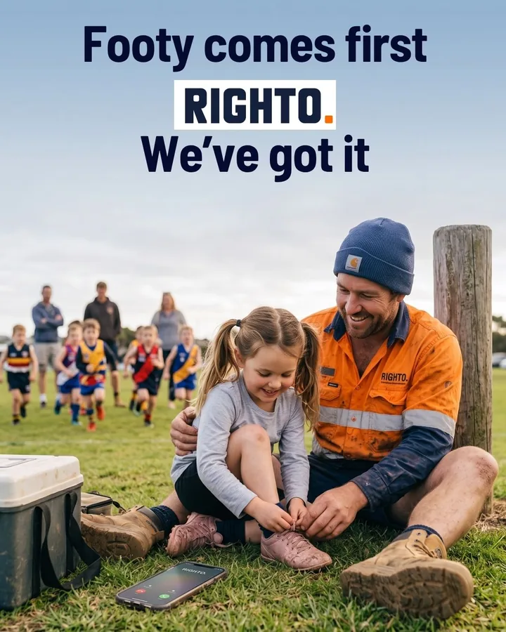 Tradie helping his daughter at junior footy